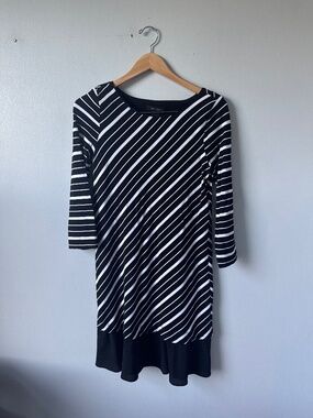 White House, black market, black and white ruffle bottom dress
